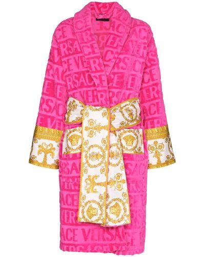 versace robe two women passing|Versace hot pink robe.